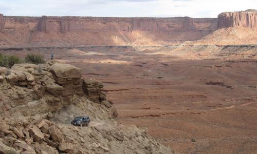 A truck makes the climb up Hogback along the White Rim Trail in Canyonlands National Park