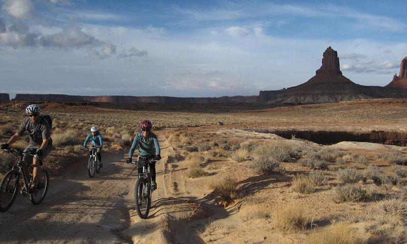 Bikers take in the views along the White Rim Trail in Canyonlands National Park